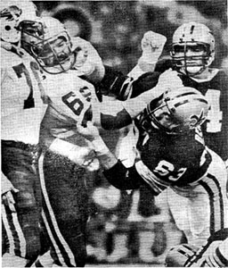 Conrad Dobler battles Barry Bennett.